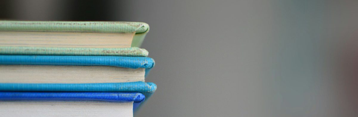 shallow focus photography of books